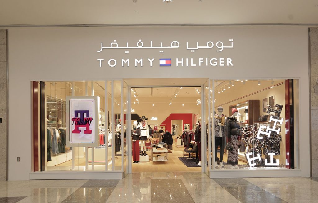 Tommy hilfiger is now open in the mall of qatar image
