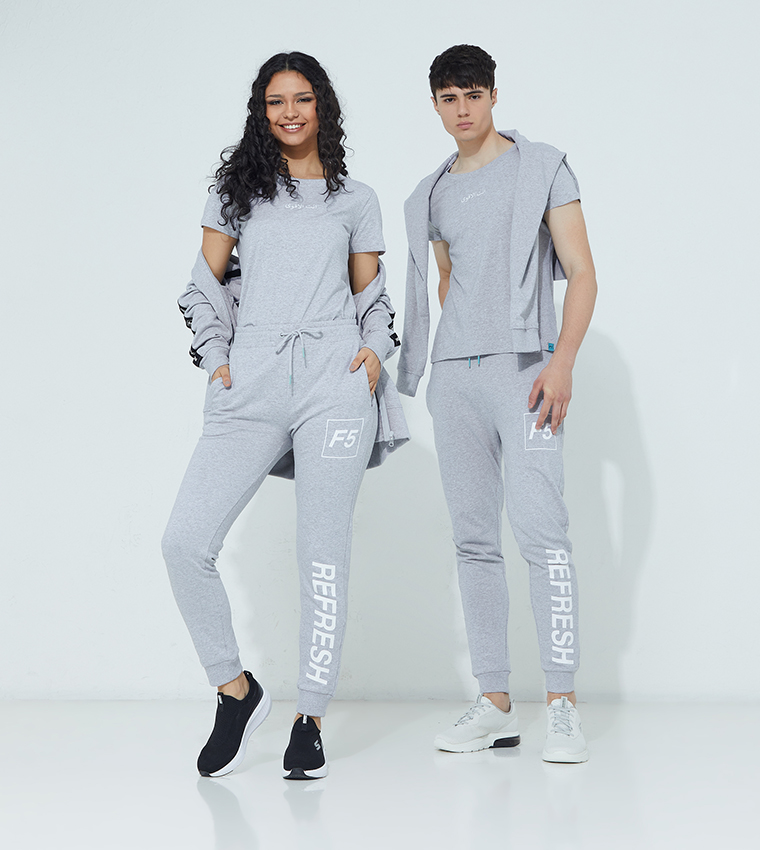a Woman and a Man Modelling F5 Clothing