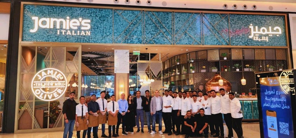 Jamie Italian Storefront with Restaurant Team Workers